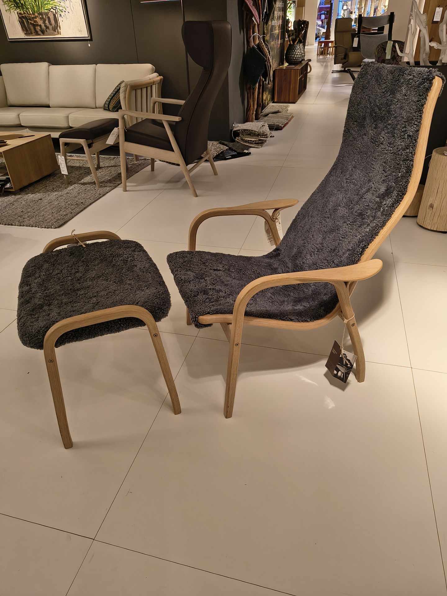 Svedese fauteuil Lamino met voetenbank